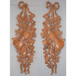 A pair of composite wall appliques in 18th century French style, formed as musical trophies