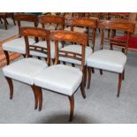 A set of six Regency mahogany dining chairs raised on sabre supports (6)