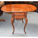 A 19th century mahogany work table, with drop leaves and raised on moulded scroll supports, with