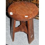 An early 20th century Liberty style oak stool, 31cm by 41cm