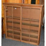 A Victorian pine glazed bookcase top, 118cm by 22cm by 116cm