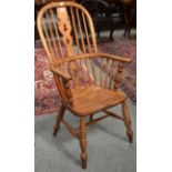 A 19th century ash and elm Windsor armchair with H stretcher