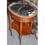 An early 20th century French kingwood marble topped two-tier oval side table, 49cm by 37cm by 74cm