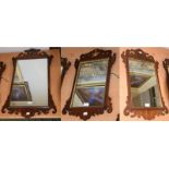 Three Regency style mahogany fret cut mirrors, two with Hoho birds (3)