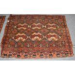 A matched pair of Ersari Chuvals, each with fox brown field and Ikat design flanked by borders of