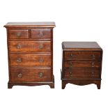 A George III Style Boxwood and Ebony Banded Mahogany Miniature Chest, of three long drawers with