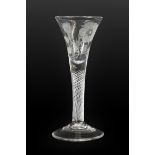 A Jacobite Wine Glass, circa 1750, the drawn trumpet bowl engraved with a rose spray with two