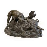 French School (19th century): A Bronze Group of a Dog Attacking a Wild Boar, on a rocky base, signed