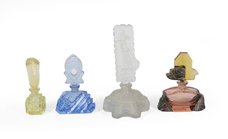 Four Differing Glass Scent-Bottles, First Quarter 20th Century, in differing coloured glass, some