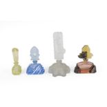 Four Differing Glass Scent-Bottles, First Quarter 20th Century, in differing coloured glass, some
