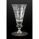 A German Ale Flute, late 18th century, the conical bowl engraved with Cupid in landscape and