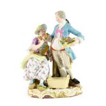 A Meissen Porcelain Figure Group, late 19th century, as a lady and gentleman in 18th century