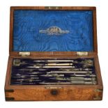 A Stanley Brass-Bound Walnut Drawing Set, circa 1900, the rectangular hinged cover set with a vacant