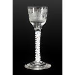 A Wine Glass, circa 1760, the ogee bowl engraved with a continuous stag hunting scene on an opaque