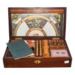 A Victorian Mahogany Games Compendium, of rectangular form, the hinged top set with a vacant brass