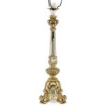A Silvered Carved Wood Altar Candlestick, Italian, 18th century, with scroll capital, on a