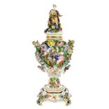 A Carl Thieme, Potschappel Porcelain Flower Encrusted Vase, Cover and Stand, late 19th century, of