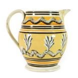 A Mocca Ware Jug, early 19th century, of ovoid form, decorated with stylised anthemion and