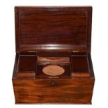 A Victorian Mahogany Tea Caddy, of rectangular form, the hinged cover with gadrooned border