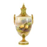 A Royal Worcester Porcelain Vase and Cover, by Harry Davis, 1919, of urn shape with twin loop