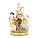 A Meissen Porcelain Figure Group, circa 1900, modelled as two girls and a boy in 18th century