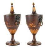 A Pair of Regency Toleware Chestnut Urns and Covers, with lion mask and ring handles on circular