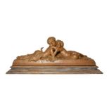After Joseph D'Aste (1881-1945): A Terracotta Bacchic Group, as two recumbent children embracing, on