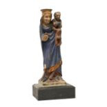 A Carved and Polychrome Figure of The Holy Family, probably South German or Bohemian, 15th/16th