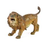 An Austrian Cold Painted Bronze Lion, early 20th century, naturalistically modelled walking with