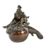 A Japanese Bronze Figure of Kinko, Meiji period, riding on a back of a large carp, signed, 14cm