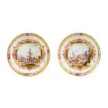 A Pair of Meissen Porcelain Saucers, circa 1730, painted with Kauffahrtei within scrolled