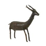 A Bronzed Figure of an Antelope, possibly Indian, 19th century, naively standing four-square, with