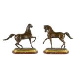 Manner of Pierre-Jules Mêne (1810-1879): A Pair of Patinated Bronze Horses, each with right