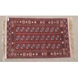 Tekke Rug North West Afghanistan circa 1960 The raspberry field with columns of quartered güls