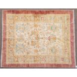 Good Ushak Design Rug Anatolia, modern The cream field of large flower heads enclosed by