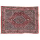 Indian Carpet, circa 1970 The Herati field with central medallion framed by samovah motif borders,