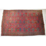 Ushak Carpet West Central Anatolia, circa 1900 The tomato red field with columns of steel blue