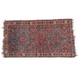 Khamseh Rug South West Iran, circa 1900 The field with three linked diamond medallions surrounded by