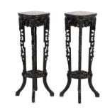 A Pair of Early 20th Century Chinese Padouk Wood and Pink Marble Plant Stands, with beaded borders