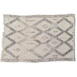Moroccan Village Rug, circa 1960 The ivory diamond lattice field containing stylised plants and
