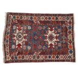 Lesghi Rug East Caucasus, circa 1900 The mid-blue field with three stellar medallions enclosed by