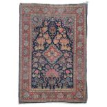 Kashan Prayer Rug Central Iran, circa 1930 The deep indigo field with an urn issuing flowers above a