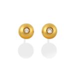 A Pair of Diamond Solitaire Earrings, the eight-cut diamonds inset within a yellow dome, total