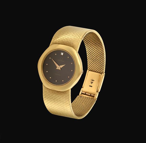 A Lady's 18 Carat Gold Wristwatch, signed Omega, circa 1975, quartz movement, black dial with dot