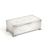 A George VI Silver Cigarette-Box, by Mappin and Webb, Birmingham, 1947, oblong and on four stepped