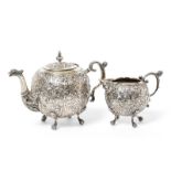 A Dutch Silver Teapot and Cream-Jug, Maker's Mark Possibly L6S, Date Letter Lacking, Circa 1900,