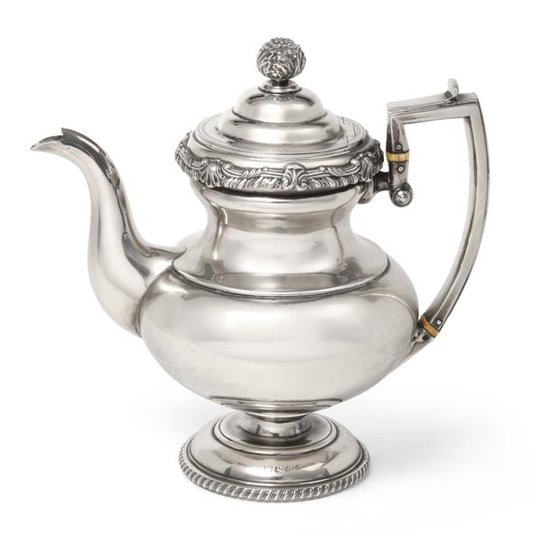 A George III Silver Coffee-Pot, by S. C. Younge and Co., Sheffield, 1814, baluster and on