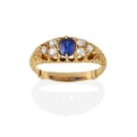 A Sapphire and Diamond Ring, the oval cut sapphire flanked by trios of old cut diamonds in yellow