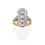 A Diamond Ring, three round brilliant cut diamonds in white rubbed over settings, to a spaced border