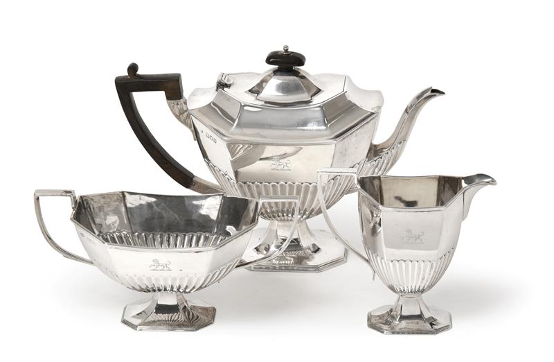 A Three-Piece Victorian Silver Tea-Service, by Hawksworth, Eyre and Co. Ltd., London, 1896, each
